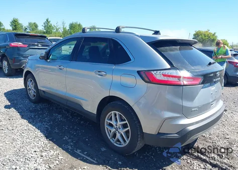 2021 Ford Edge Sel z USA, uszkodzony, nr VIN 2FMPK4J96MBA13557
